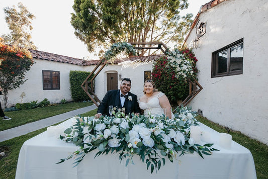 Confident plus-size bride in her wedding dress, glowing with joy and self-love.