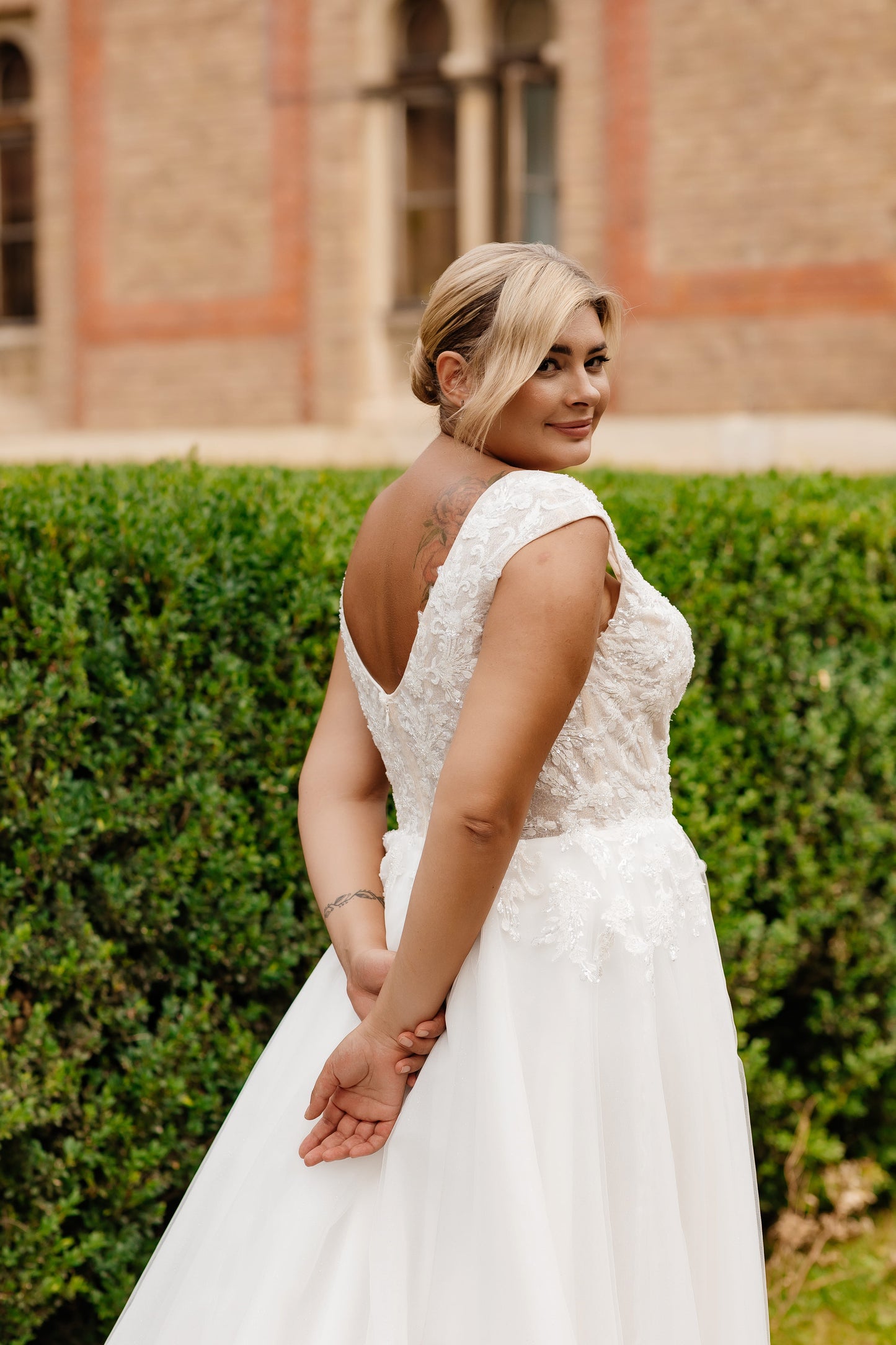Plus Size Lace A-Line Wedding Dress with Cap Sleeves and V-Neck