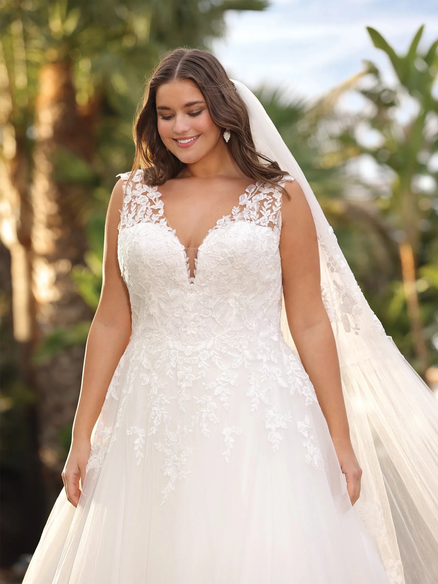 Tulle bridal gown with lace straps and floral embroidery for full figure
