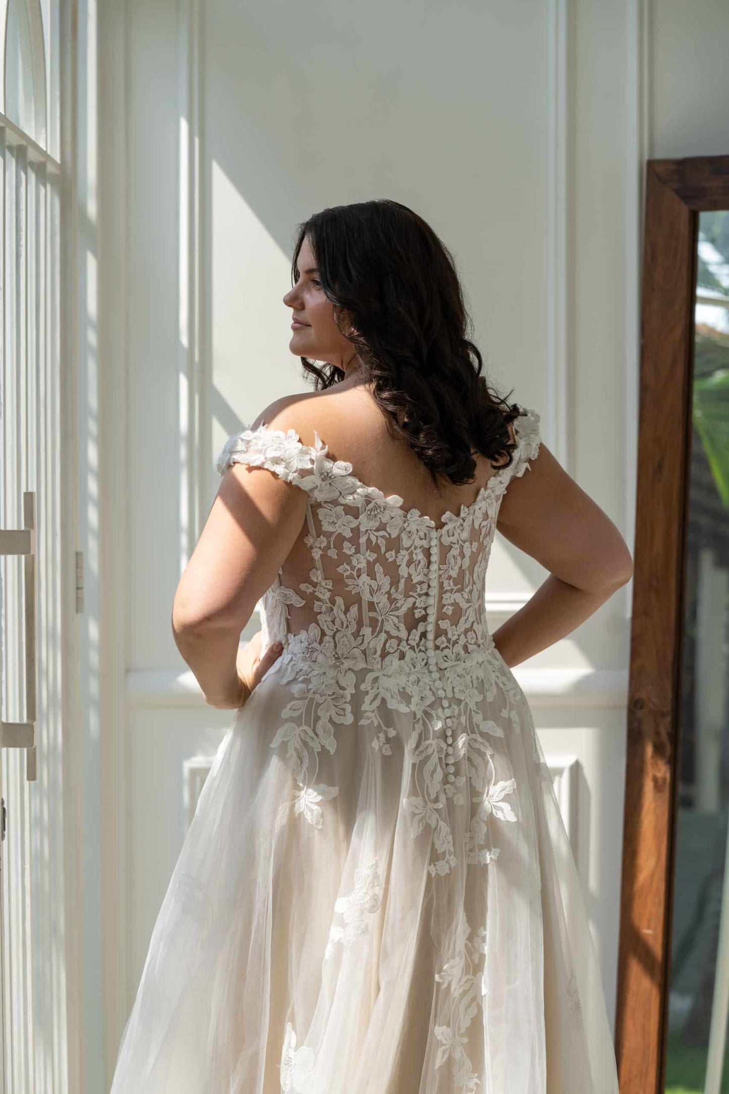 A-line wedding dress with lace bodice designed for plus size bride