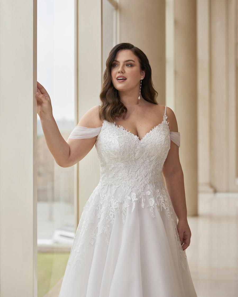 A-line bridal dress for curvy bride with detailed floral lace and soft silhouette