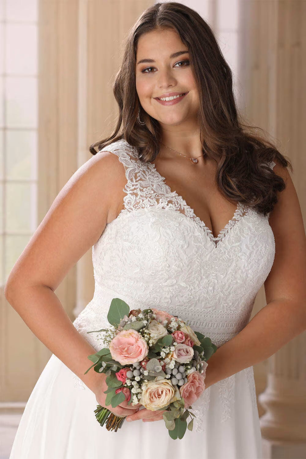 Chiffon wedding dress with cap sleeves designed for plus size brides