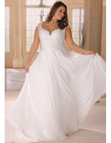 Sheer back chiffon wedding gown with soft lace details for full figure
