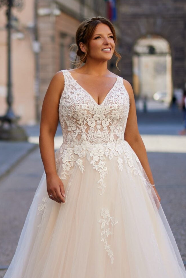 Elegant backless plus size bridal gown with sweep train
