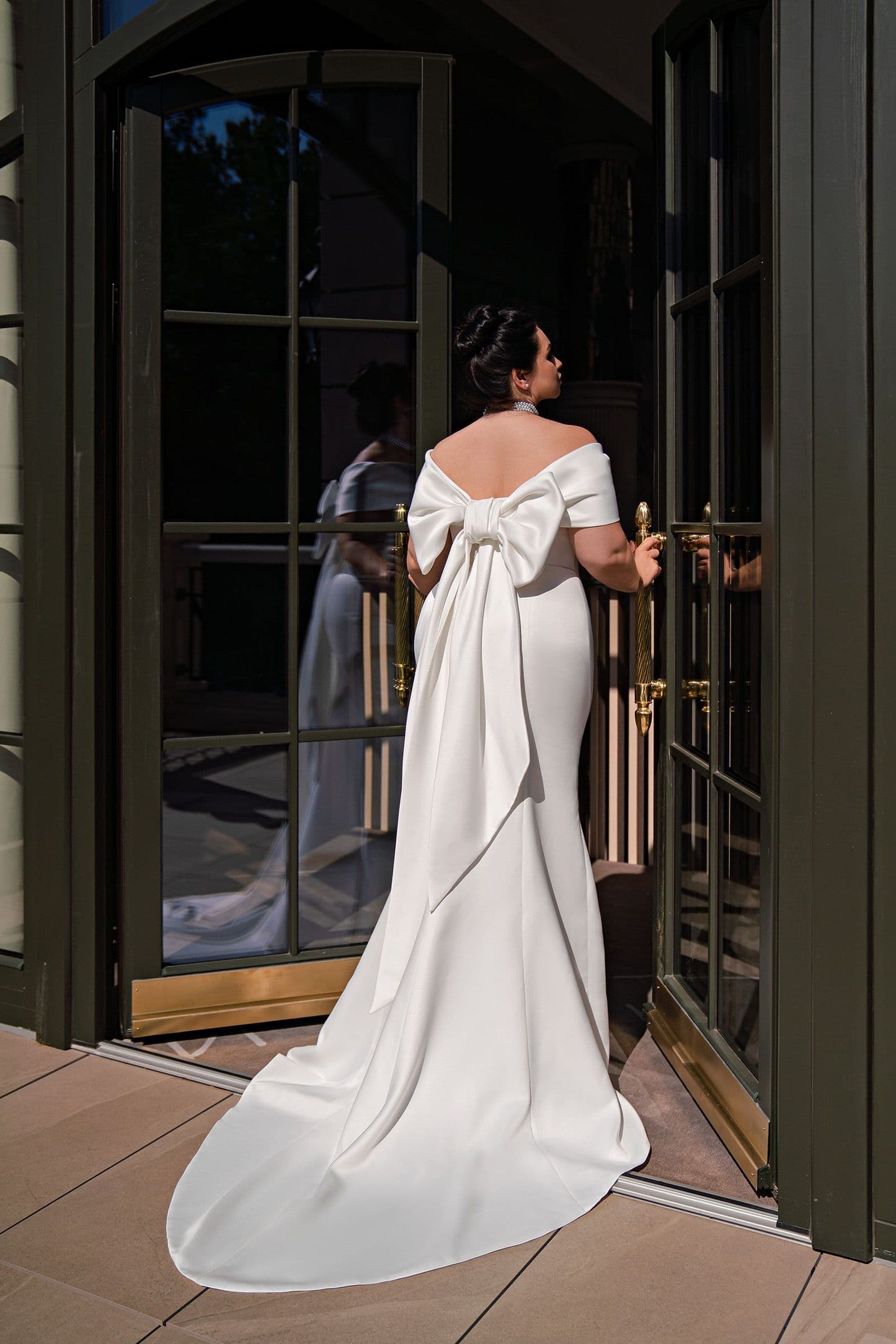 Strapless mermaid gown designed for plus size women, flattering and elegant