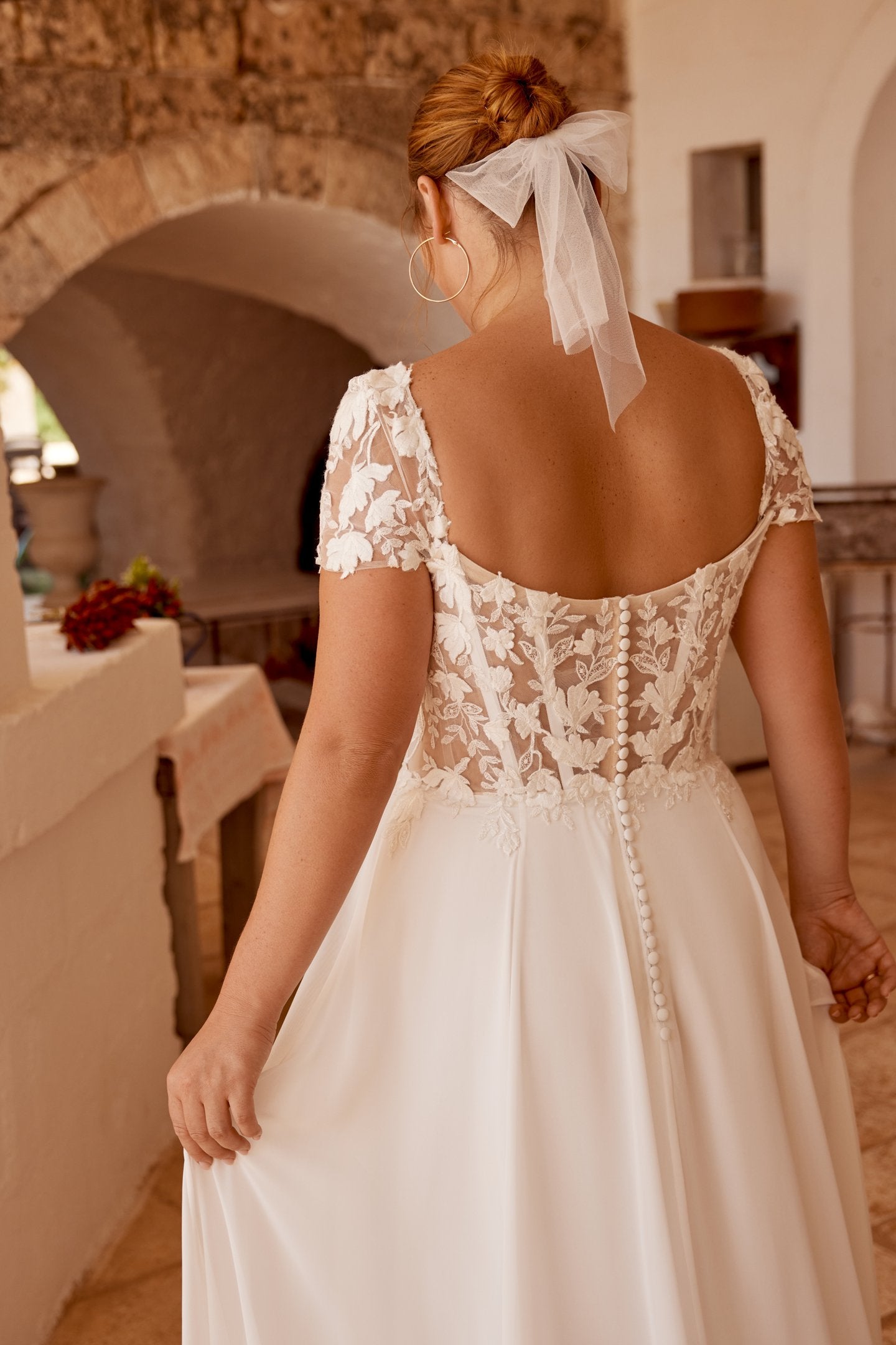 Illusion lace bodice with back buttons for plus size bride