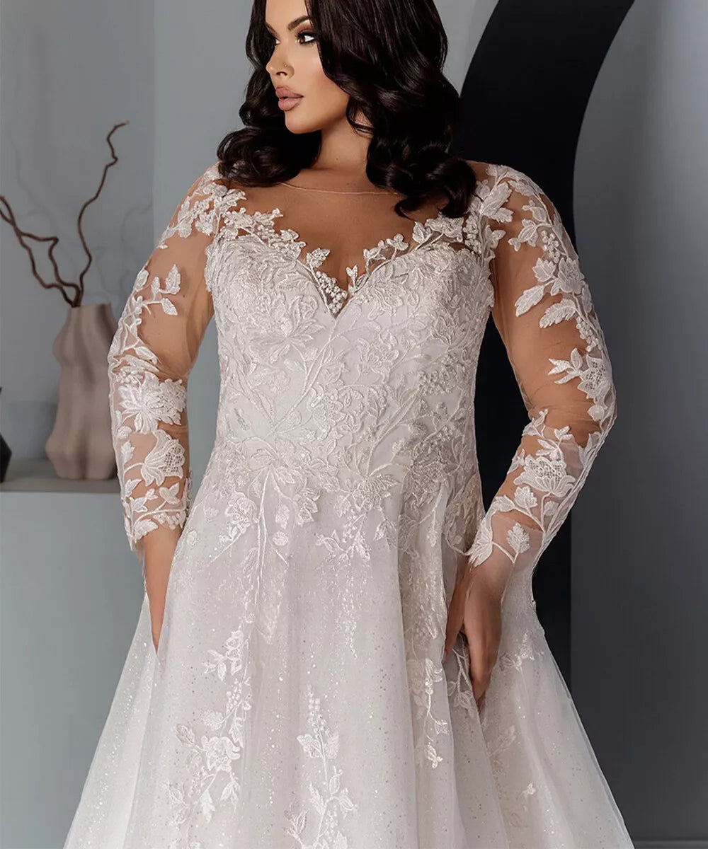 Illusion neckline lace wedding dress for plus size brides seeking elegance