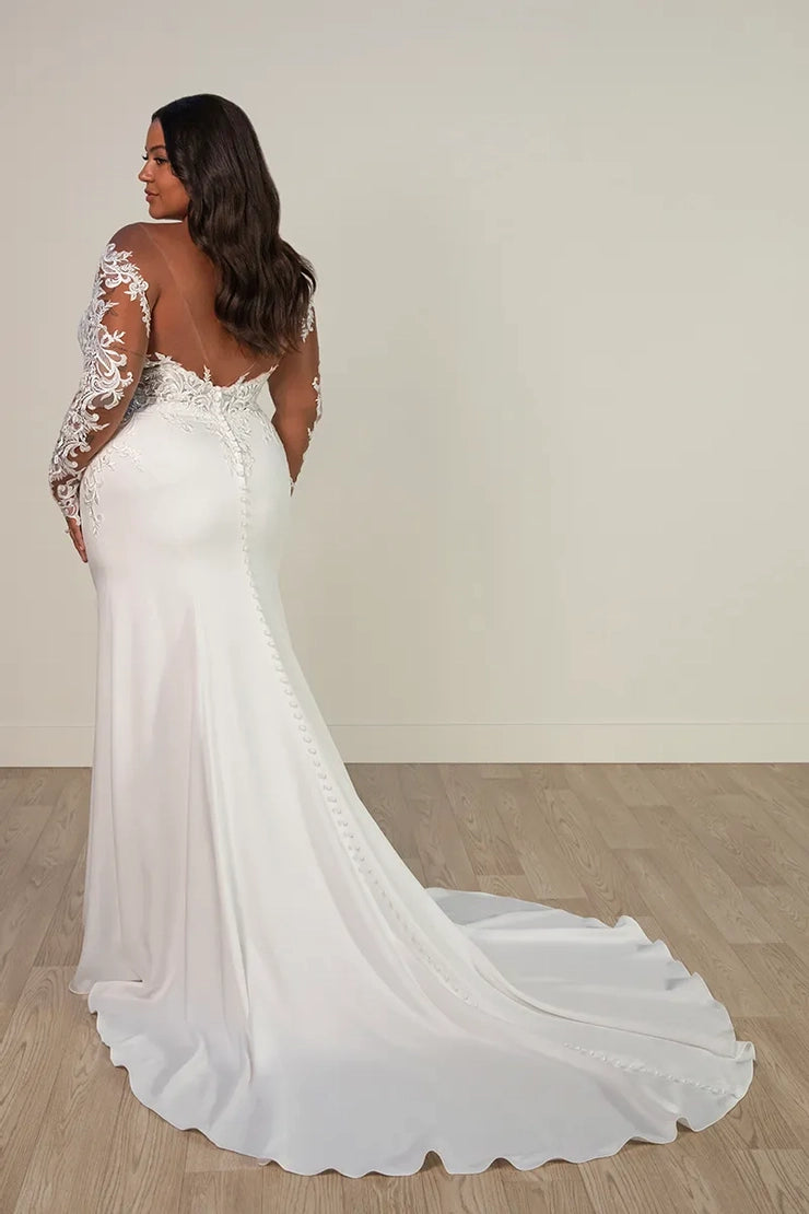 Mermaid wedding gown with lace appliqué and long sleeves for curvy bride