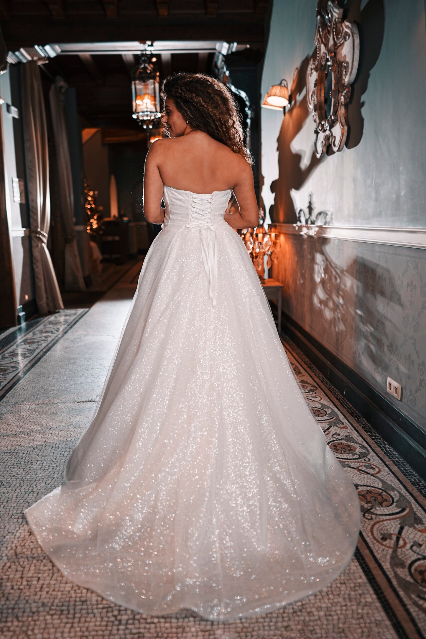 Luxury sparkly wedding gown with sweetheart neckline and soft train