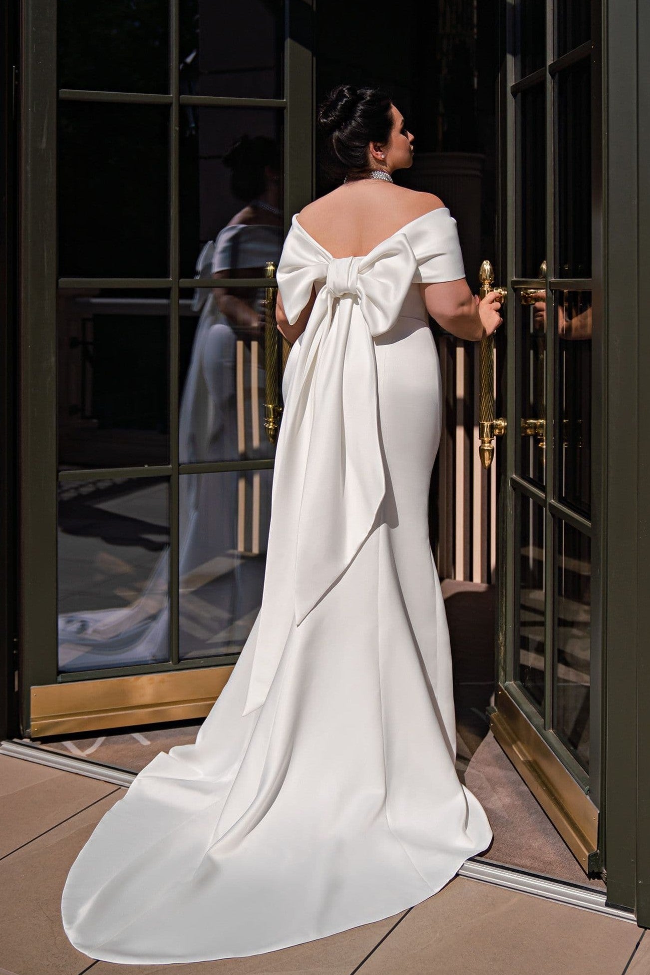 Minimalist plus size mermaid wedding dress perfect for elegant modern weddings