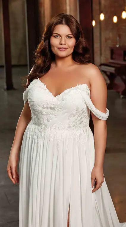 Modern plus size bridal gown with side slit and button-back detail