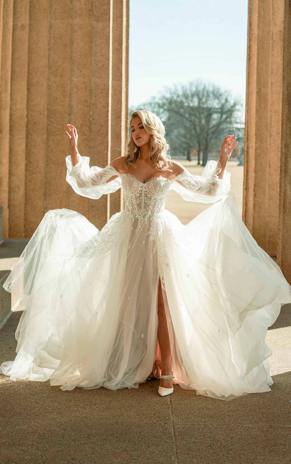 Modern plus size bridal style featuring a tasteful side slit