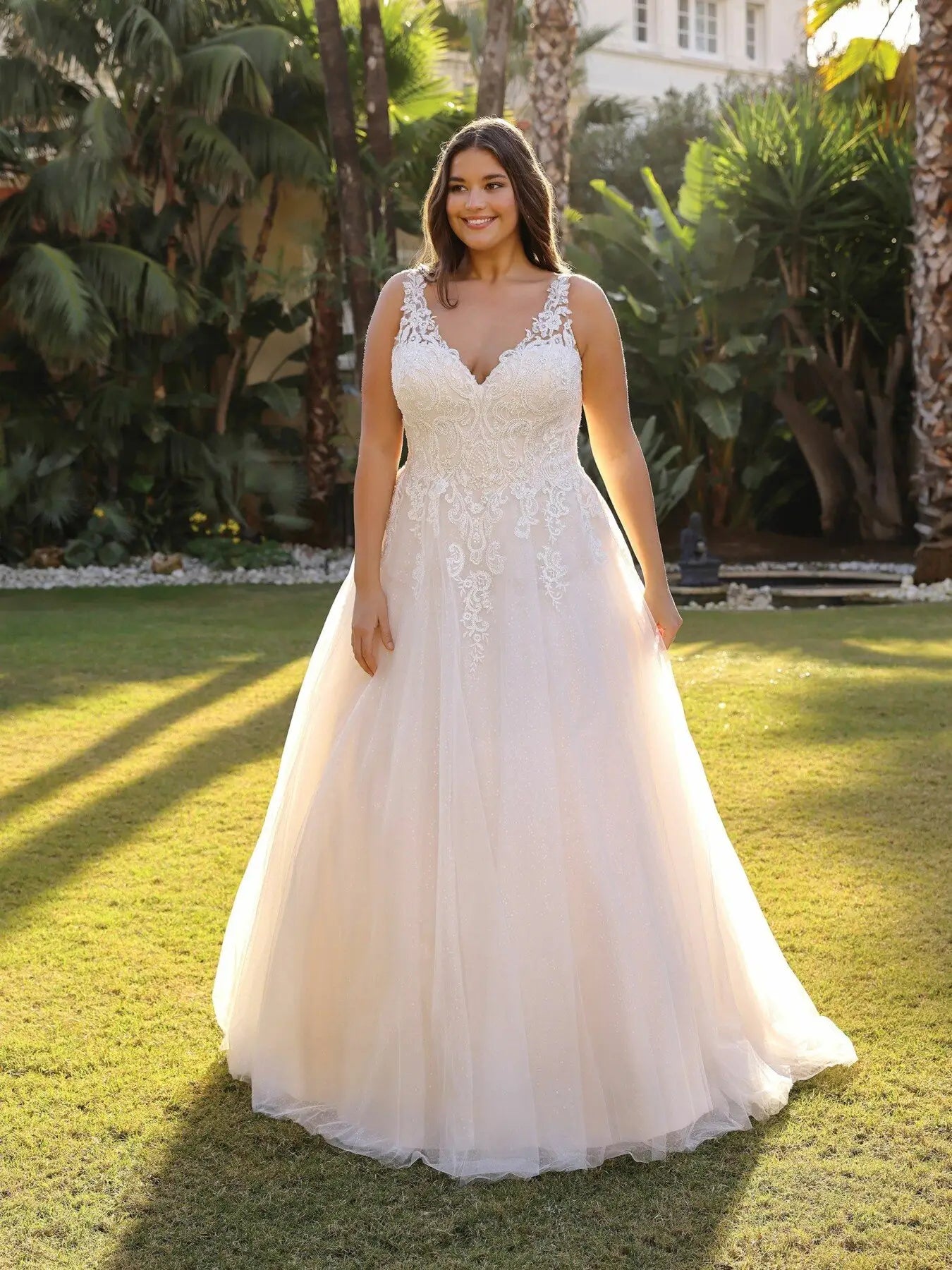 A-line plus size wedding dress with lace bodice and double V-neck front