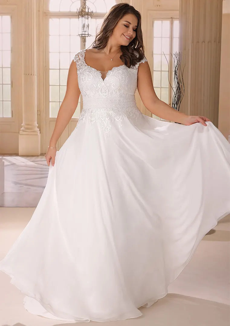 Plus size chiffon A-line wedding dress with lace bodice and flowing skirt