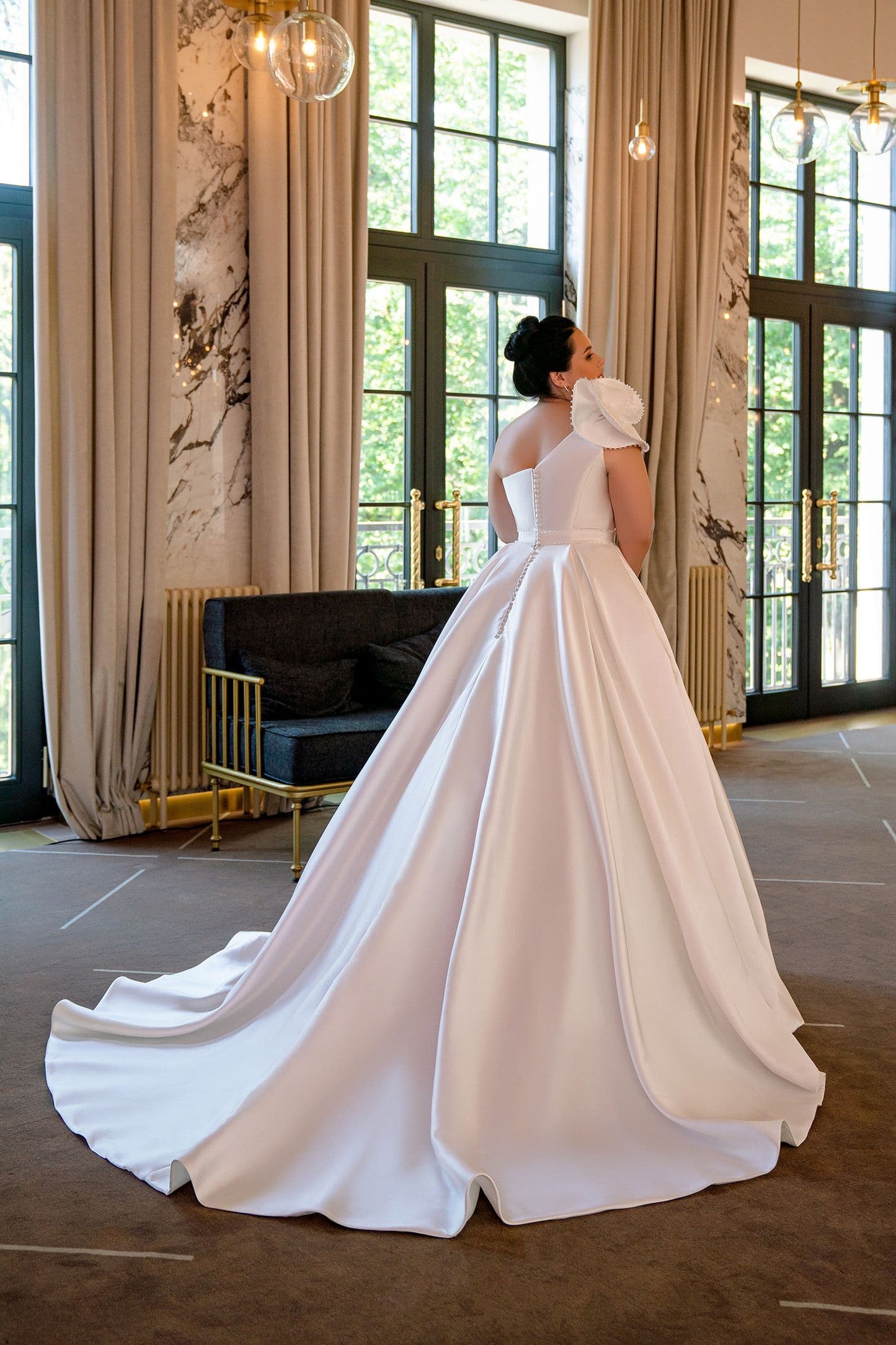 Plus size one-shoulder satin ball gown wedding dress back view