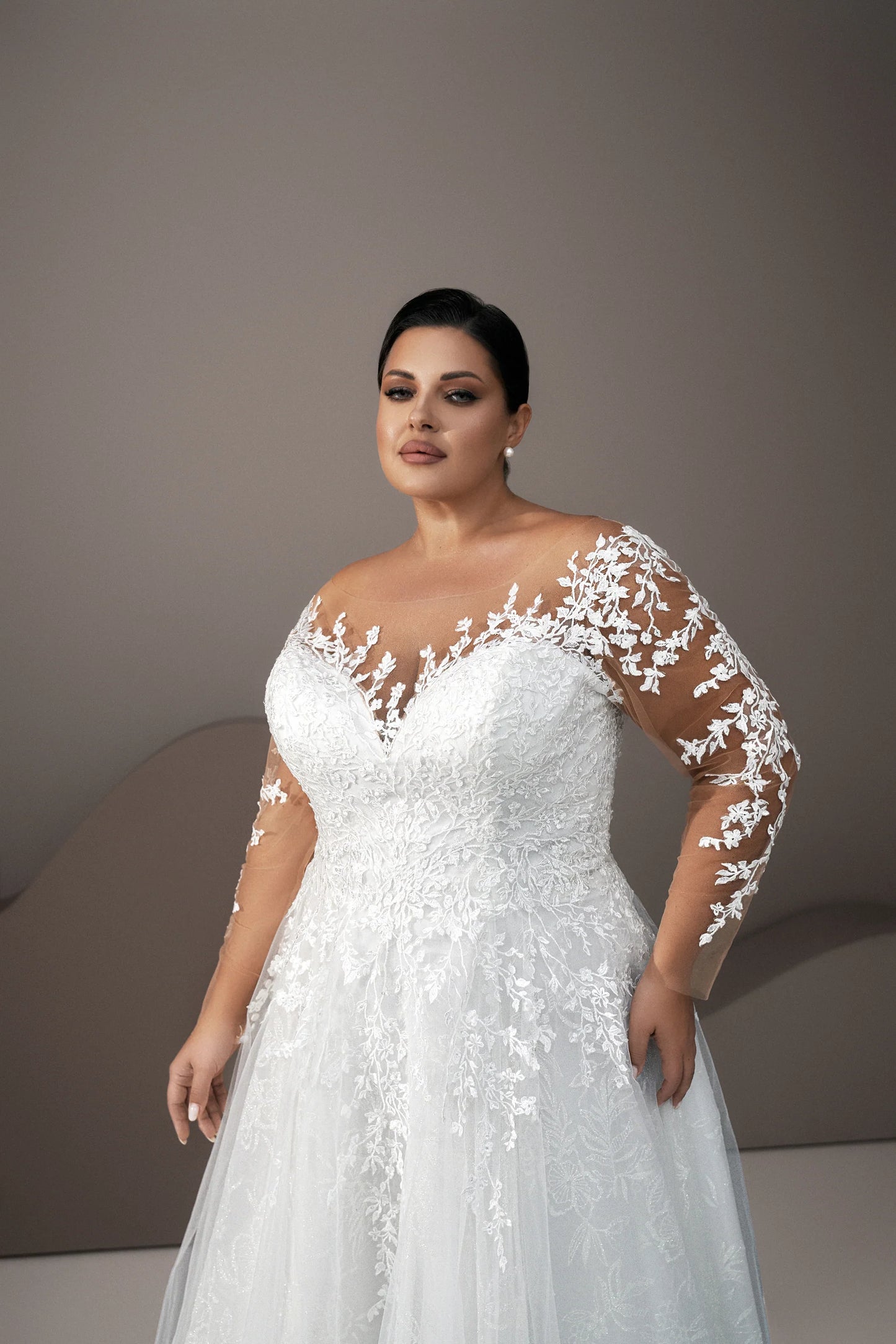 Back view of wedding gown showing button illusion back