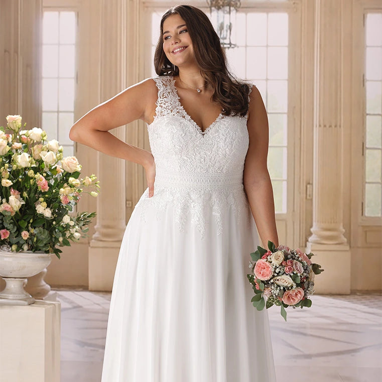 Romantic A-line bridal gown for curvy brides with elegant silhouette