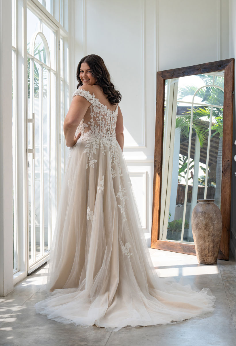 Romantic wedding dress with floral lace and illusion neckline