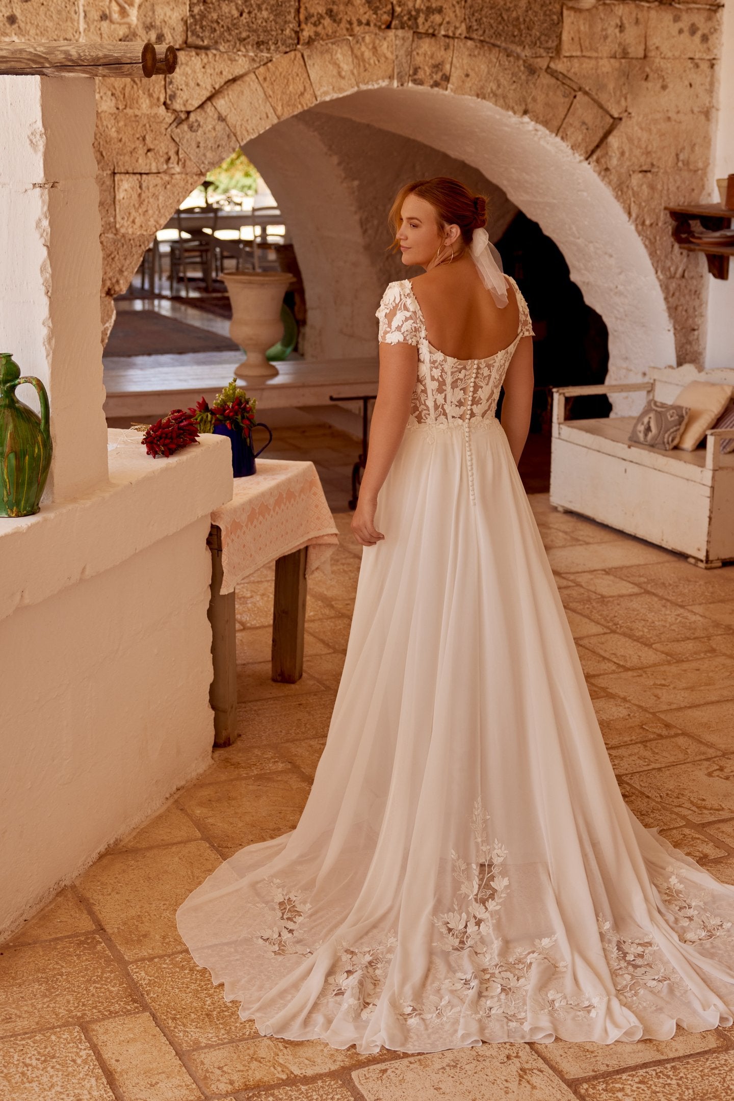 Flowy wedding dress with lightweight chiffon and lace appliqué