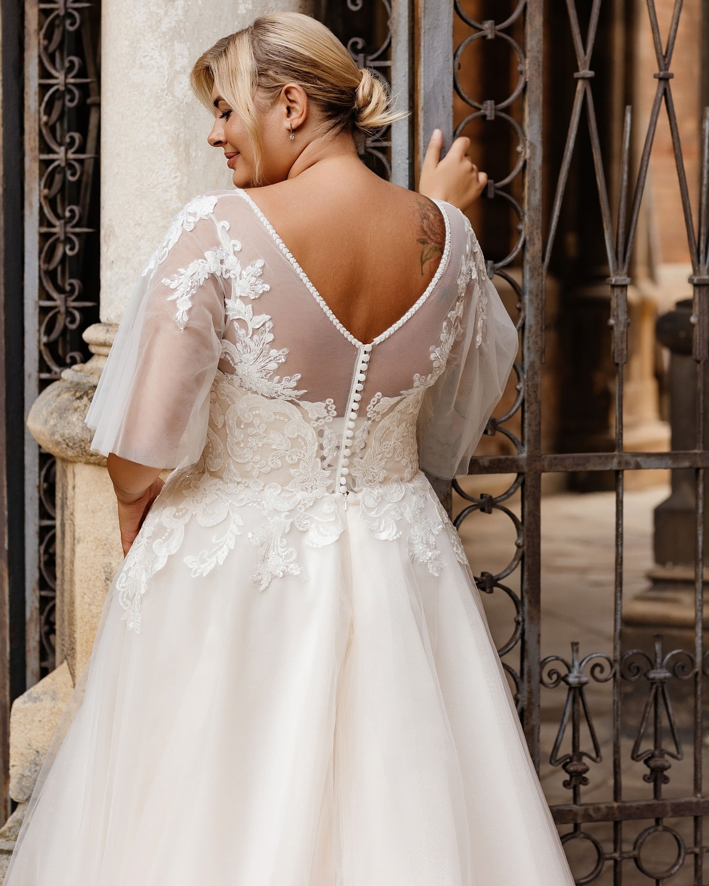 Soft half sleeve bridal gown for curvy women with bohemian charm and light fabric