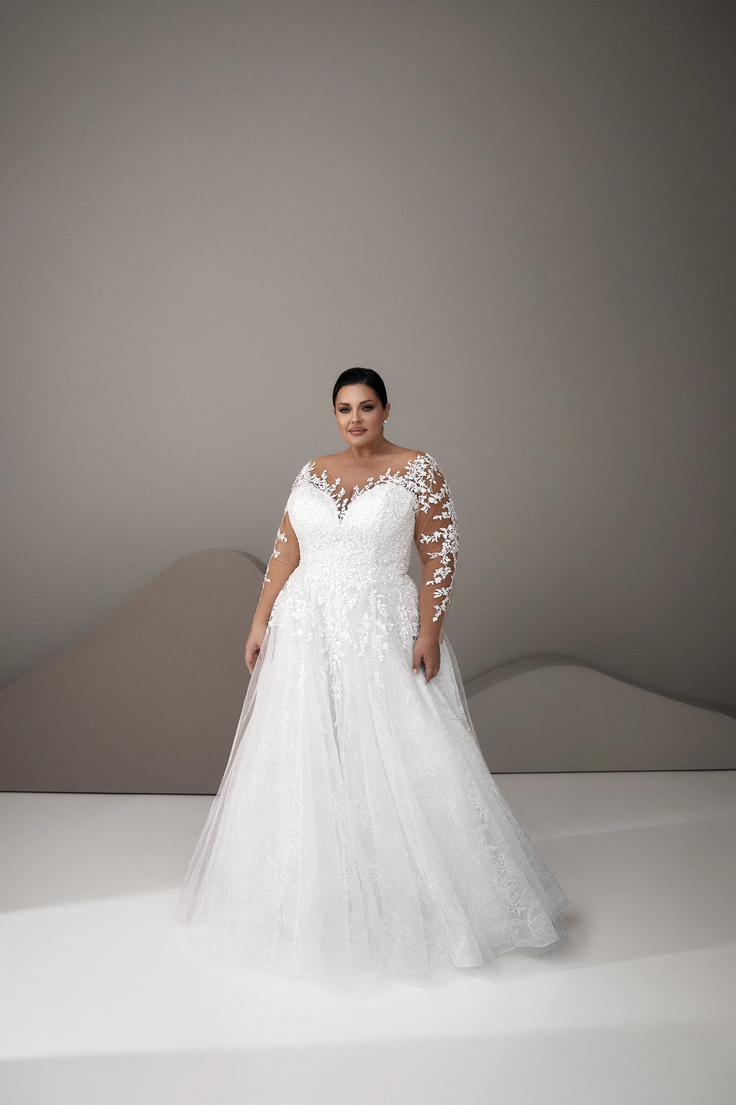 Romantic lace plus size wedding dress with flowing tulle skirt