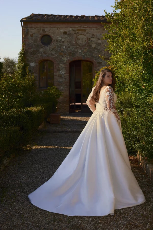 Plus size satin bridal gown with side slit and 3D floral details