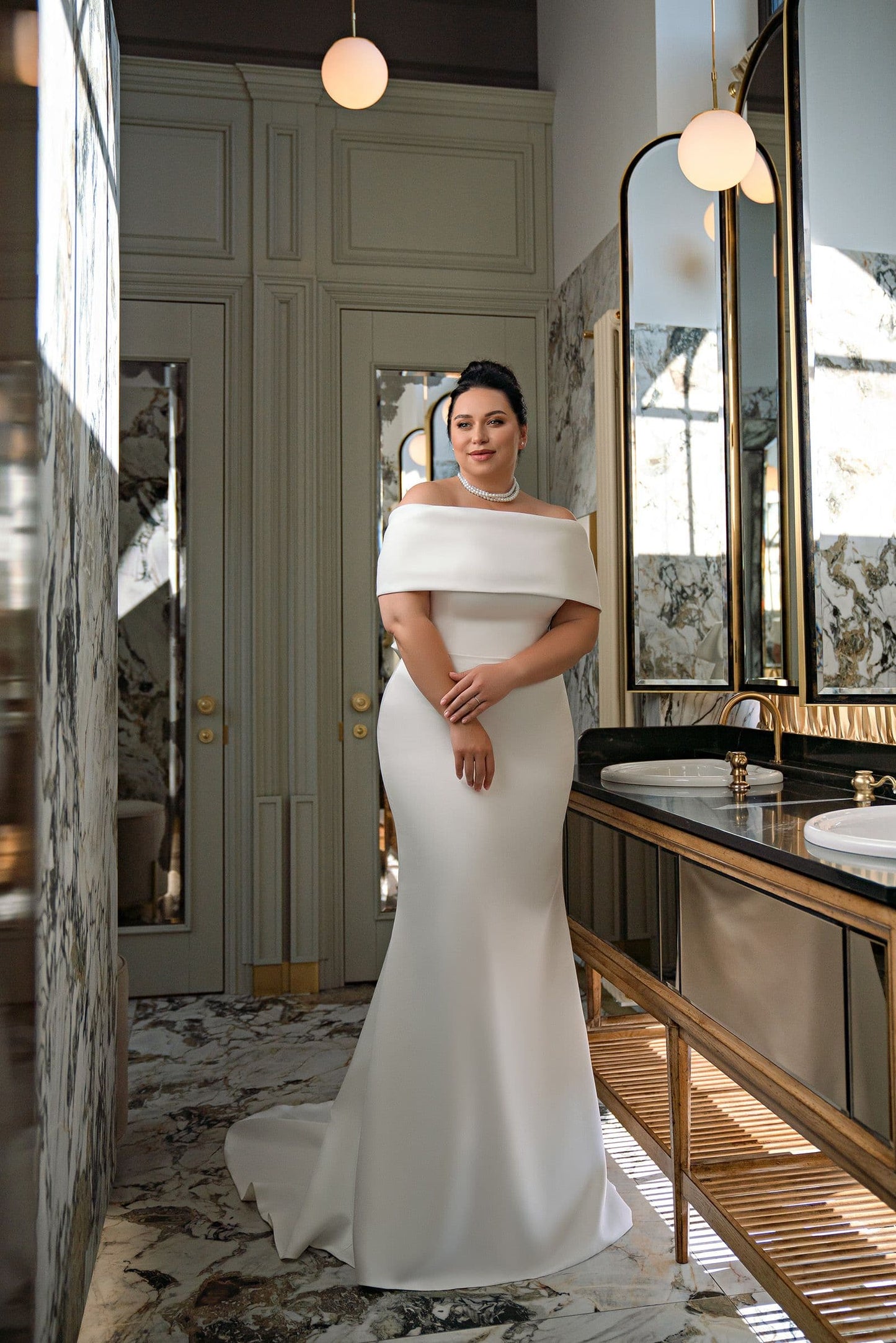Satin wedding dress with sweep train for plus size brides seeking refined beauty