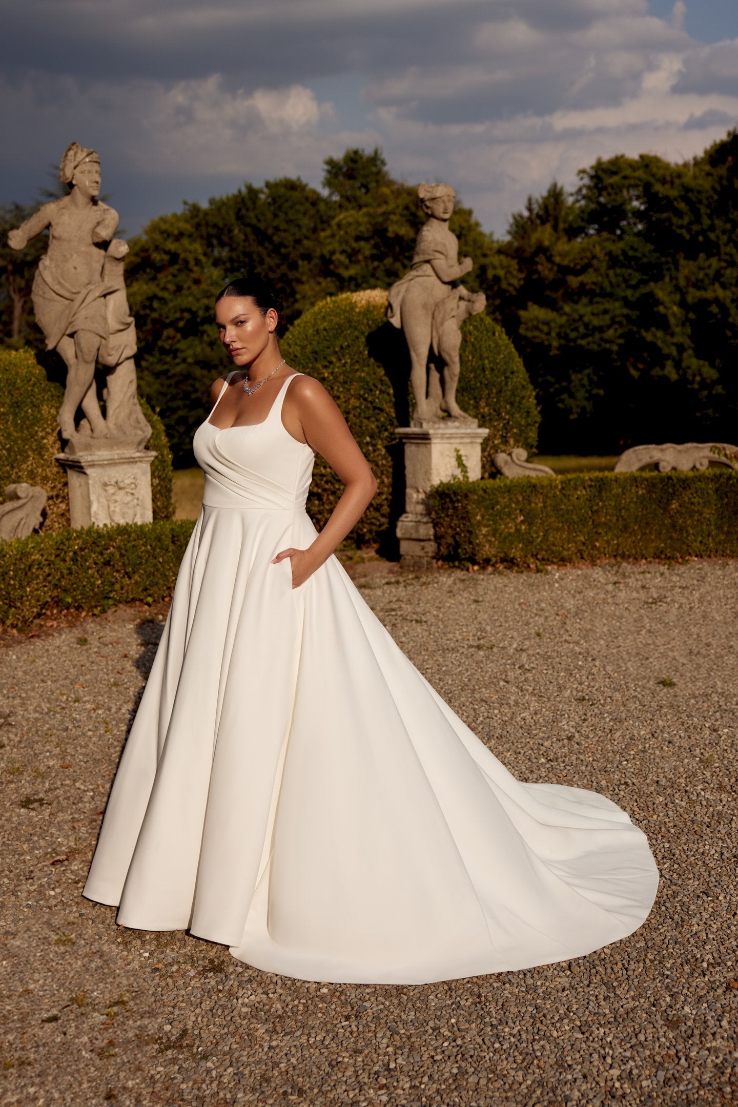 Simple plus size wedding dress with sweep train and classic design