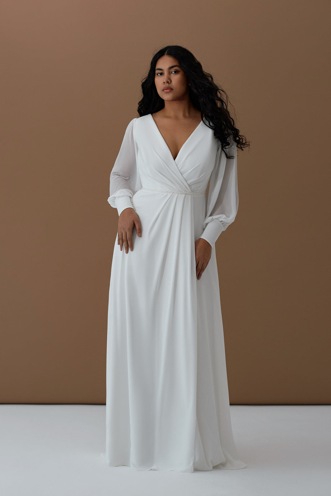 Simple plus size bridal gown with puff sleeves