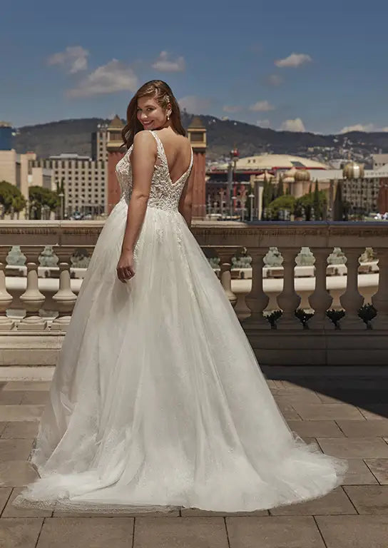 A-line tulle wedding gown for plus size bride with flowy skirt