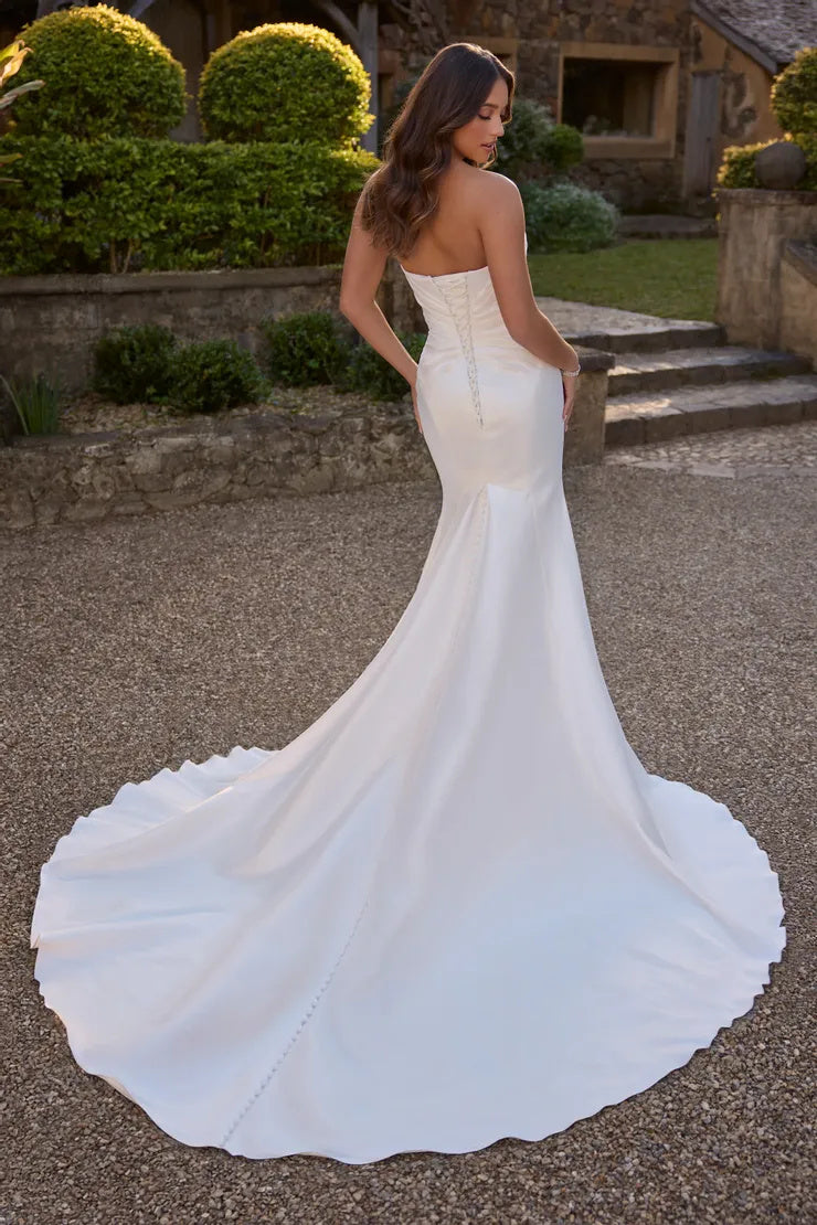Strapless modern mermaid gown for curvy bride with clean lines