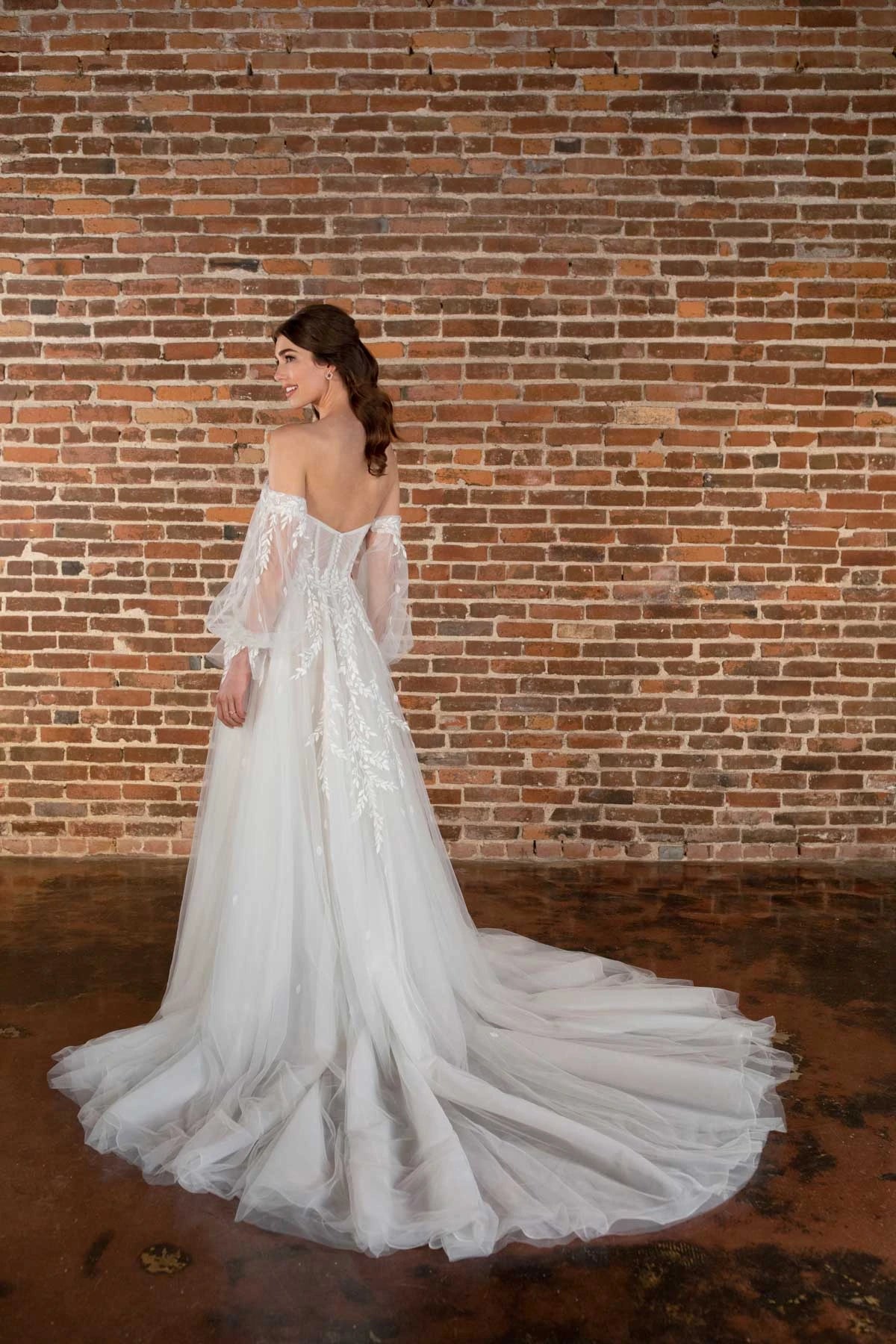 weetheart neckline and sheer off-shoulder sleeves on plus size bride dress