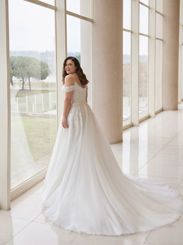 V neck lace bridal gown designed to enhance curves and support bust area