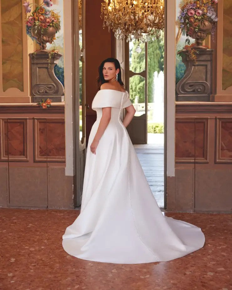 Plus size wedding gown with hidden pockets and modern satin finish