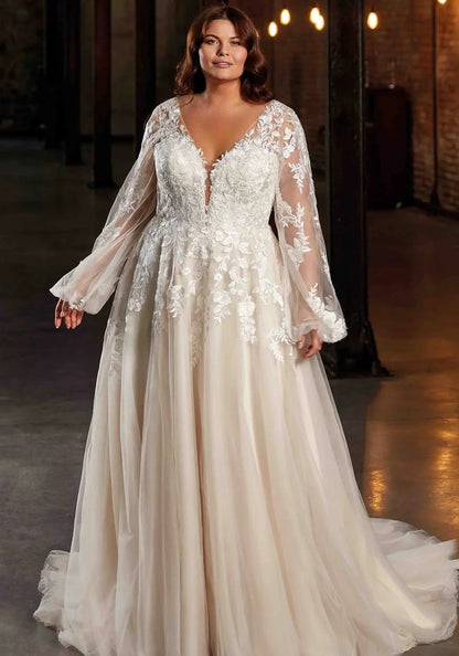 Elegant A-line bridal gown with sheer sleeves and lace for plus size bride