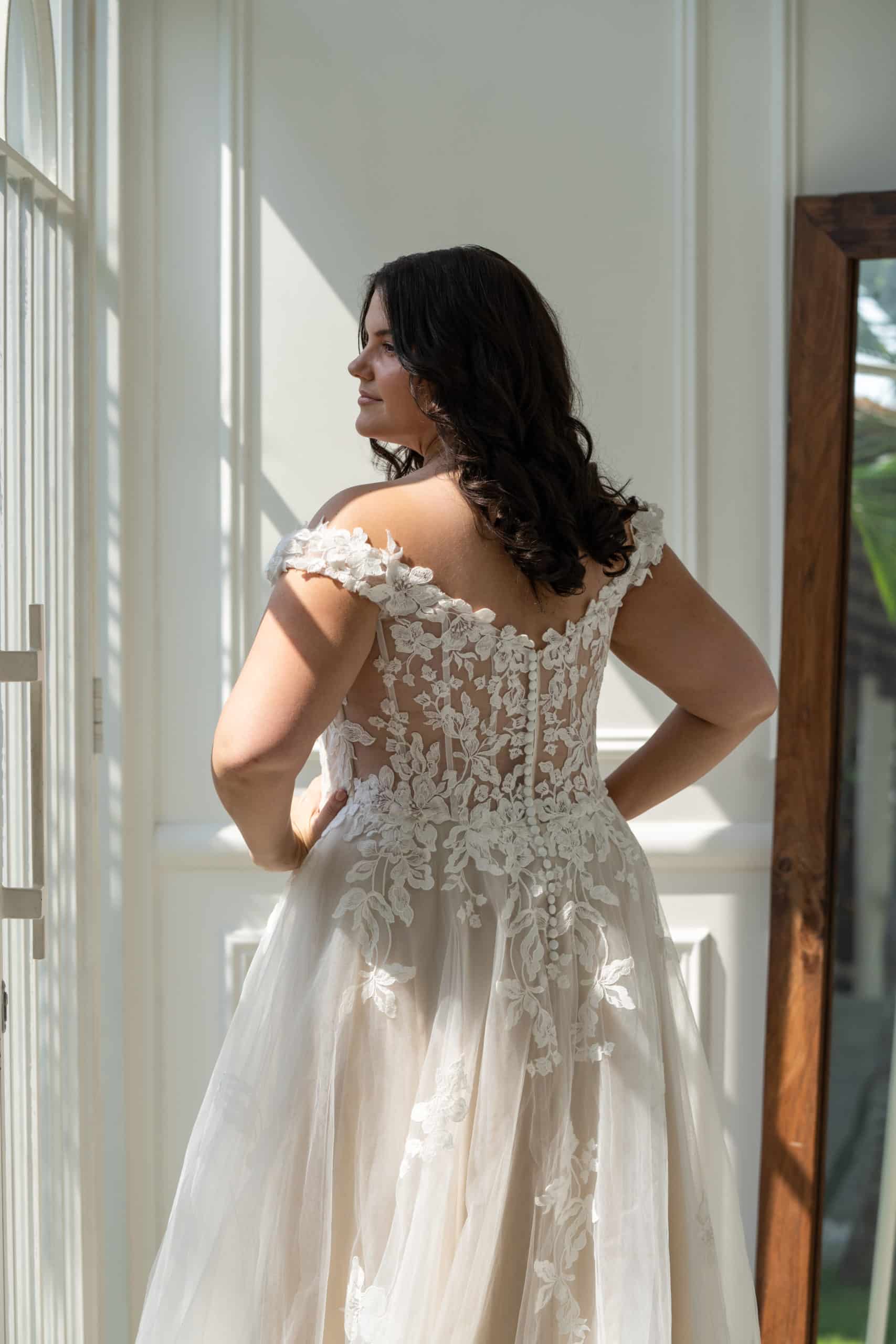 A-line wedding dress with lace bodice designed for plus size bride


