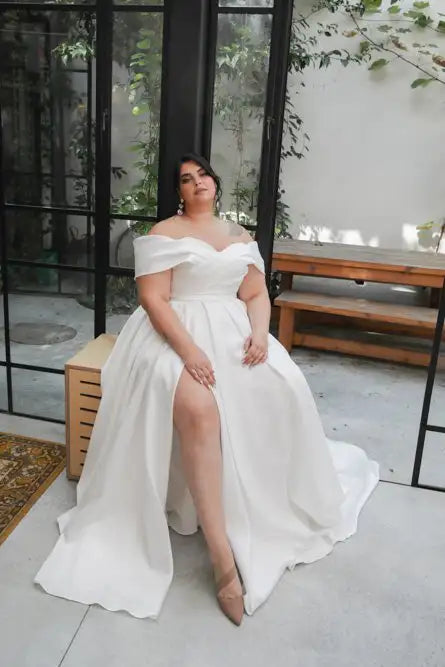 Lace-up back satin wedding gown for full-figure bride with train