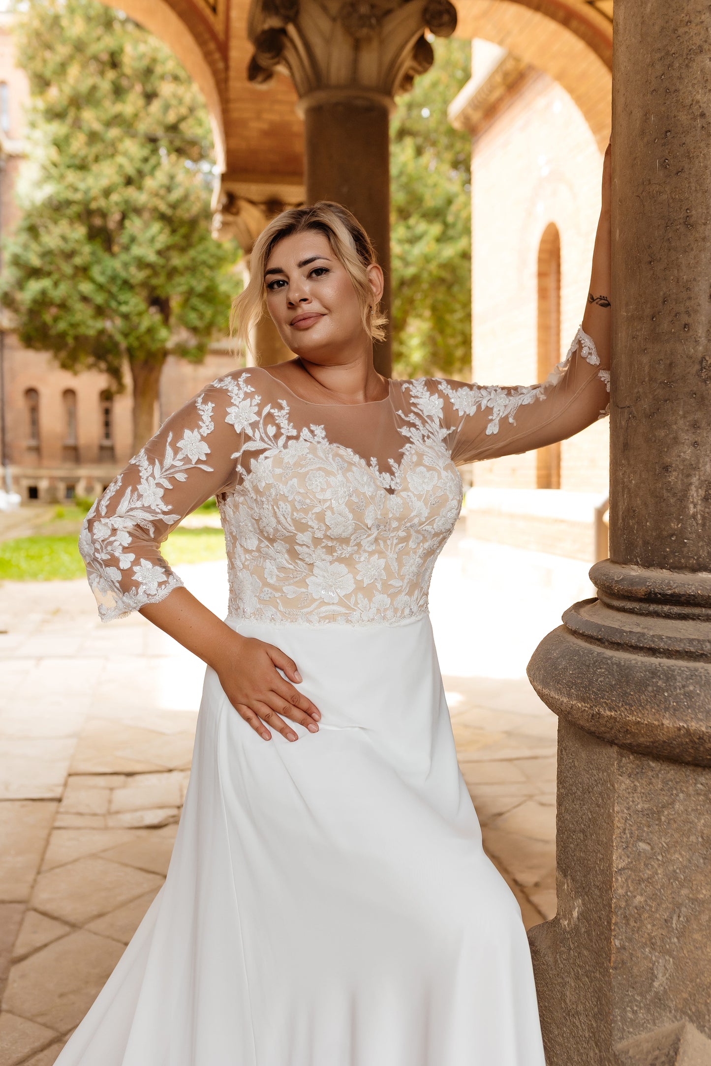 Elegant backless A-line wedding dress designed for plus size brides