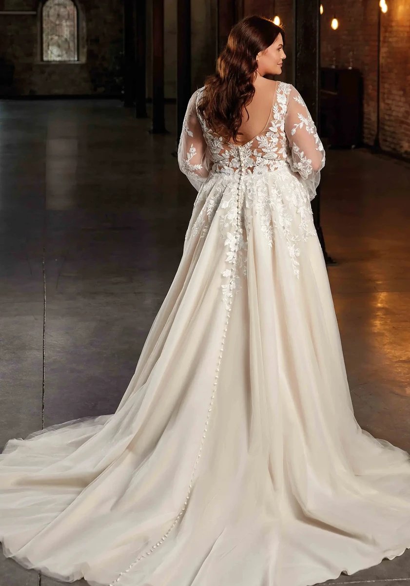 Back view of sheer lace backless wedding dress with buttons