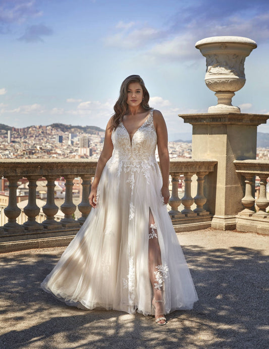 Boho plus size lace wedding dress with floral appliqué front view