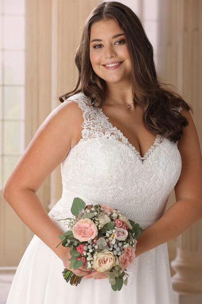 Chiffon wedding dress with cap sleeves designed for plus size brides


