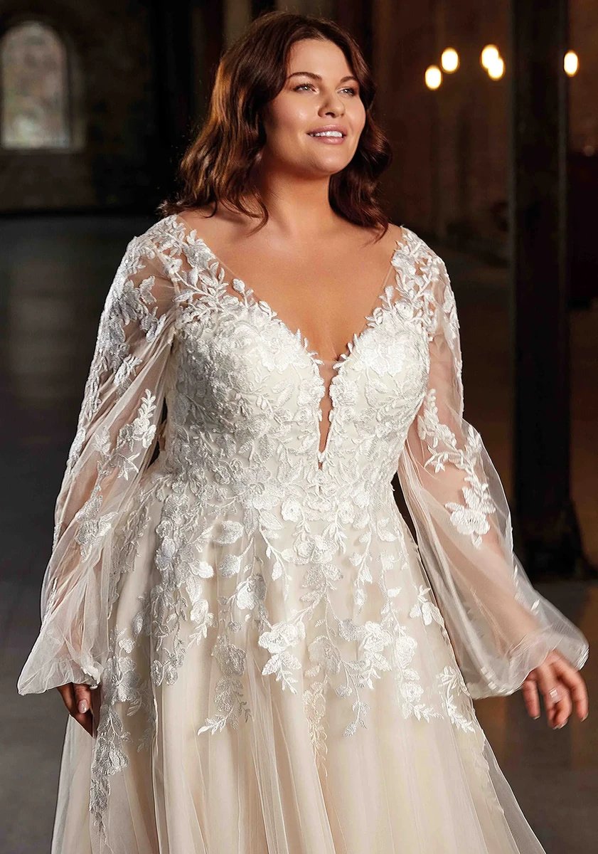 A-line lace bridal gown with sweep train for plus size bride