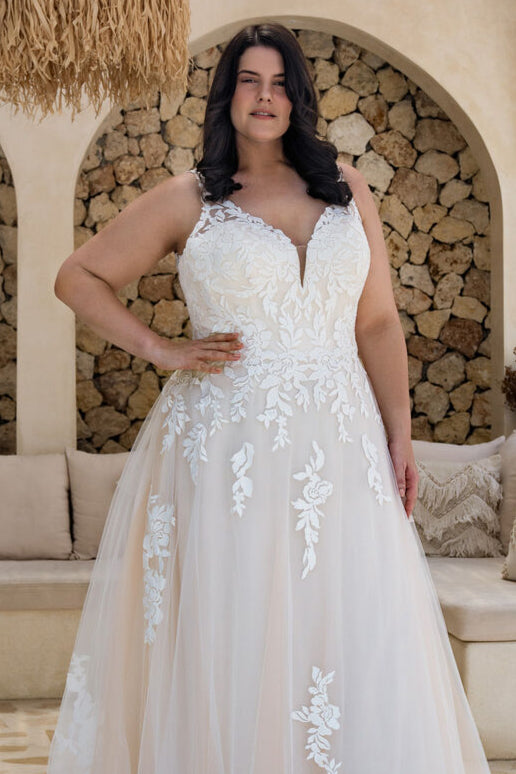 Double V-neck bridal gown in soft tulle with romantic floral lace for curvy brides