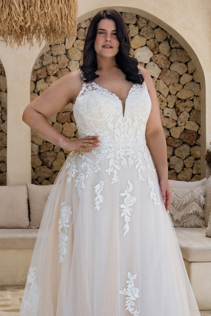 Double V-neck bridal gown in soft tulle with romantic floral lace for curvy brides