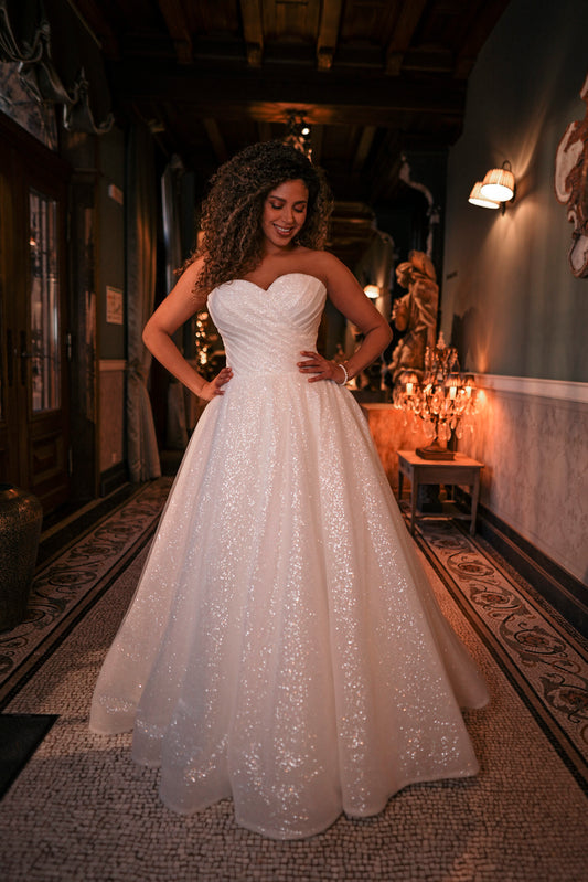 Glitter tulle A-line wedding dress for plus size brides with romantic sweetheart neckline