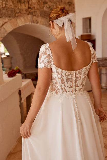 Illusion lace bodice with back buttons for plus size bride