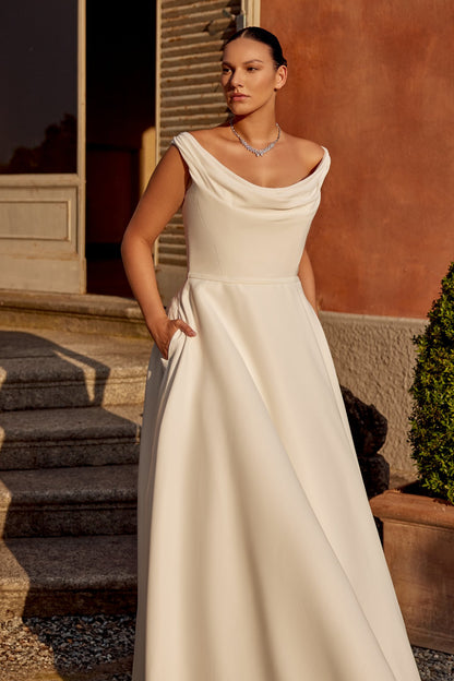 Minimalist plus size wedding dress in satin with flattering A-line cut