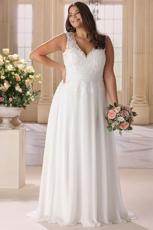 Plus size chiffon wedding dress with lace bodice and cap sleeves front view