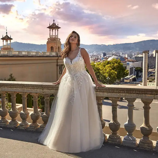Boho style plus size wedding dress with soft tulle and V-neck design