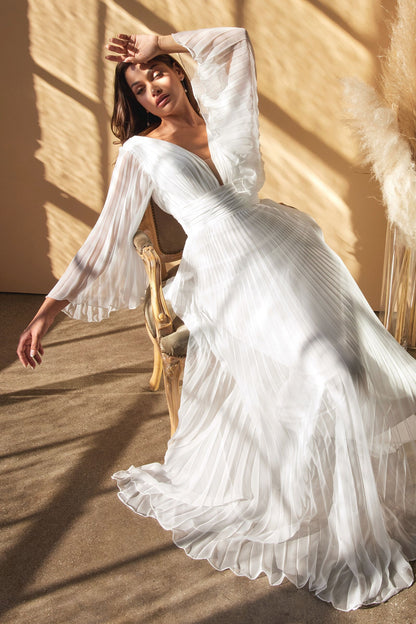 Billowy sheer sleeve detail on plus size chiffon wedding gown